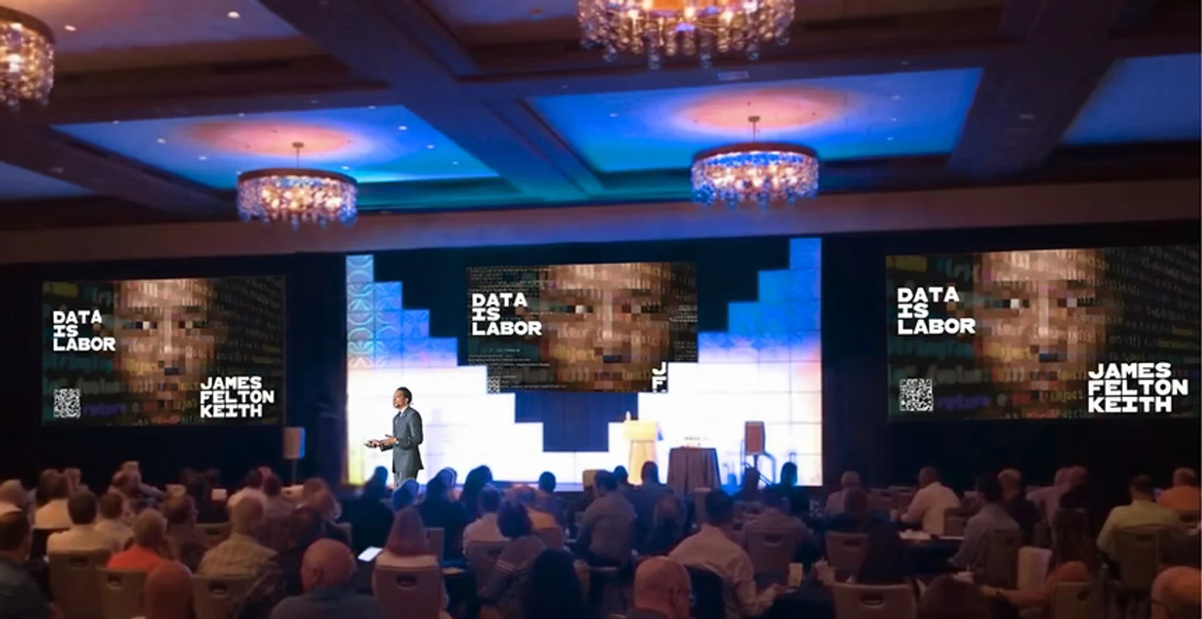 James Felton Keith speaking on a Data Is Labor keynote stage.